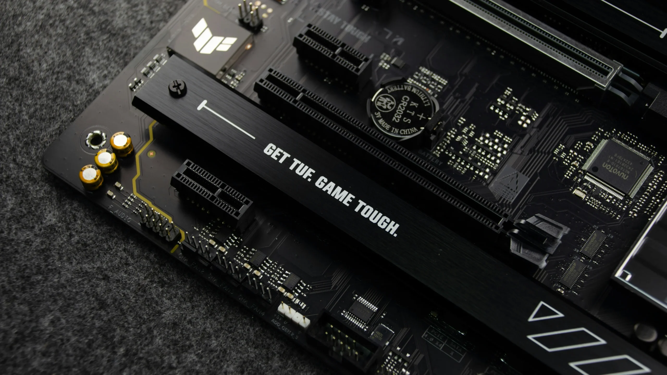 A computer repair technician in San Jose performing a high-speed SSD upgrade on a professional workstation for a local business client.