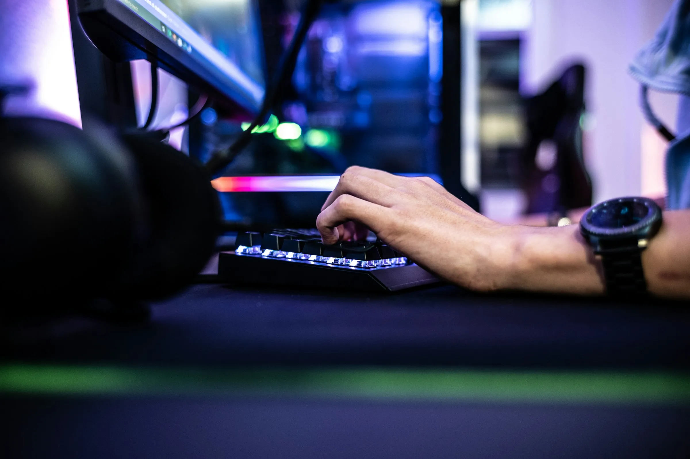 High-performance custom gaming PC and professional business workstation in a San Jose office setting, representing specialized gaming upgrades and small business IT support services.